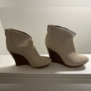 Cream Wedge bootie, suede with brown heel.
